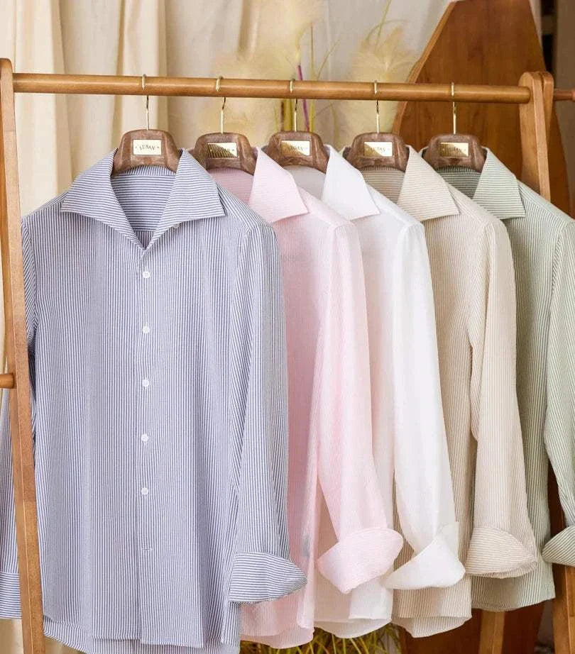 Vintage Italian long sleeve shirts on hangers.