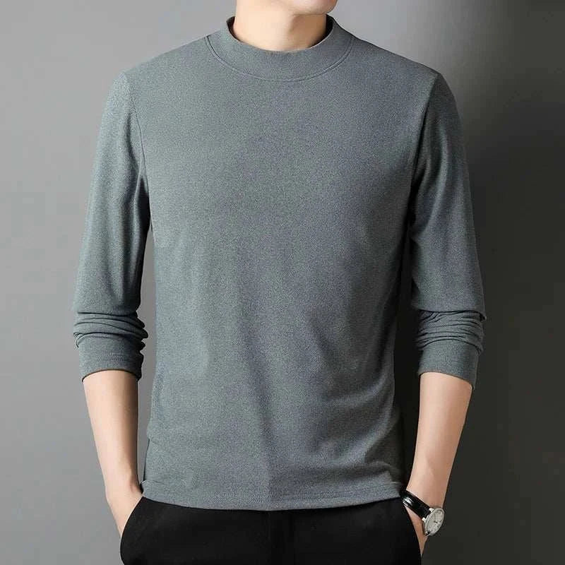 Men’s classic turtleneck sweater in solid gray, featuring long sleeves and a casual, elegant design.