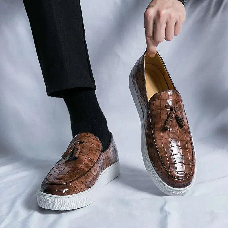 Casual slip-on loafers in brown suede with white soles, featuring elastic side panels and cushioned insole for comfort.