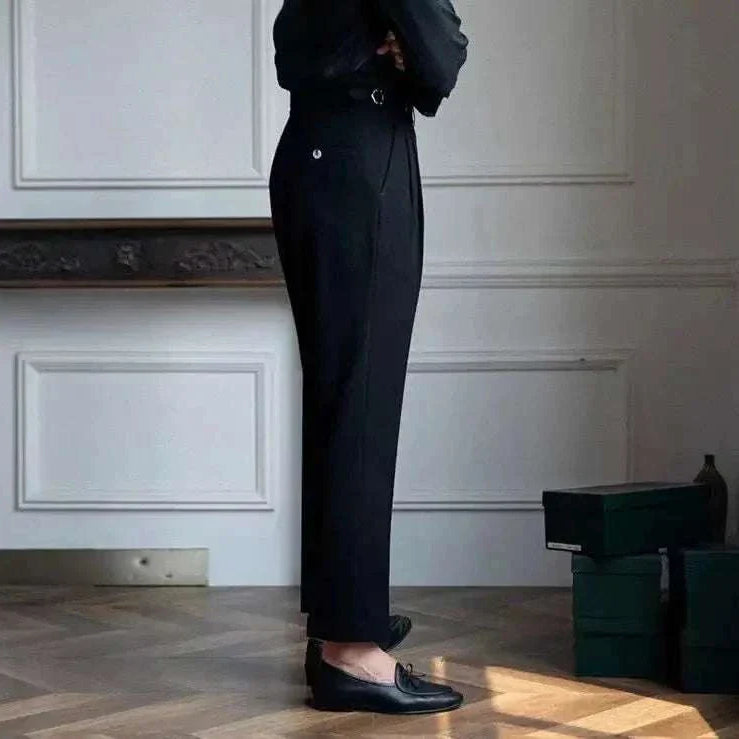 High-waist belt design trousers in elegant black viscose fabric, side view.