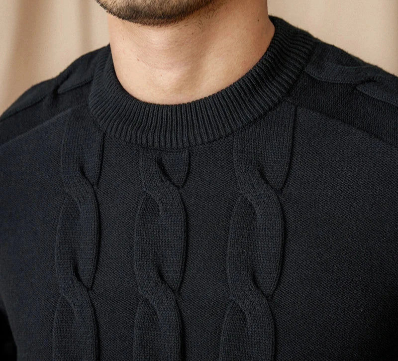 Round neck vintage sweater in black with cable knit design.