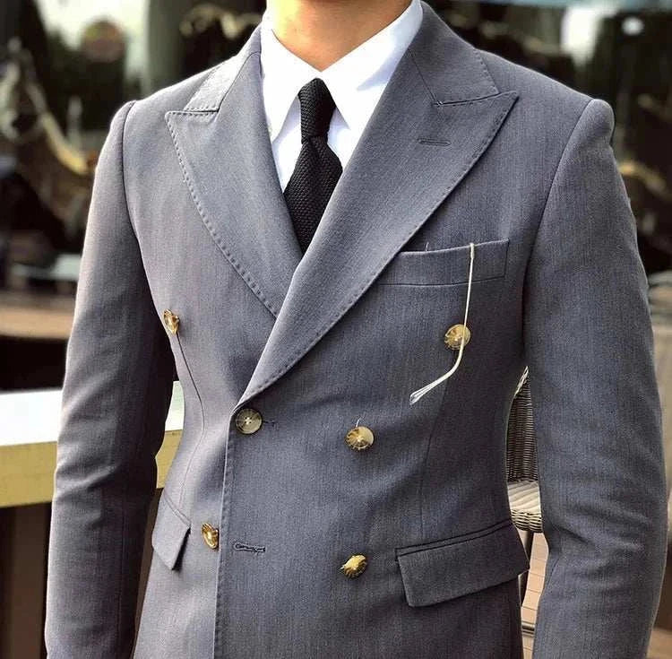 Mariage elegant suit in gray with gold buttons, made from polyester and viscose.