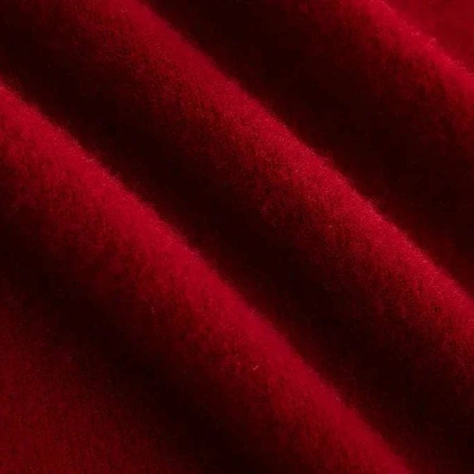 Close-up texture of red wool fabric for business wool turtleneck sweater.