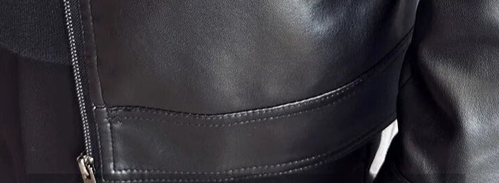 MOTO black leather jacket made from eco-leather, close-up view.