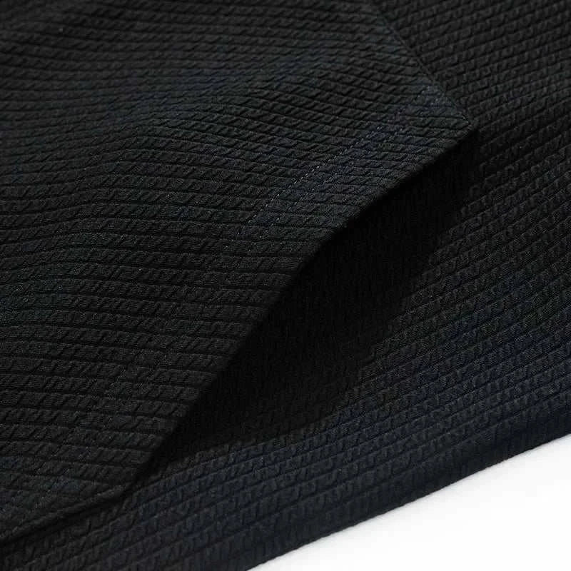 Close-up of fabric texture for winter cardigan sweater with zipper.