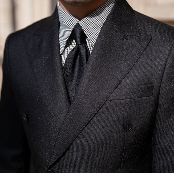 Antonios Double Breast Suit in black with a solid pattern, ideal for business or events.