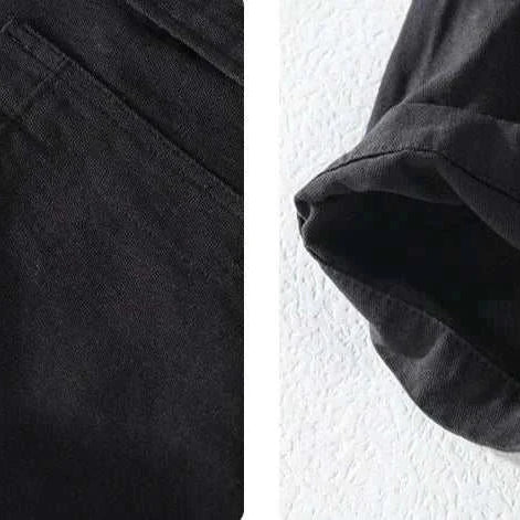 Close-up of a premium short sleeve summer shirt, highlighting the solid black cotton fabric and stitching details.