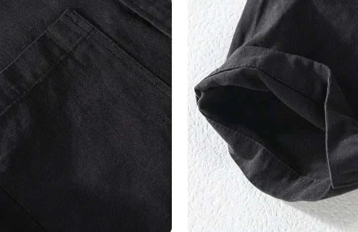 Close-up of a premium short sleeve summer shirt, highlighting the solid black cotton fabric and stitching details.