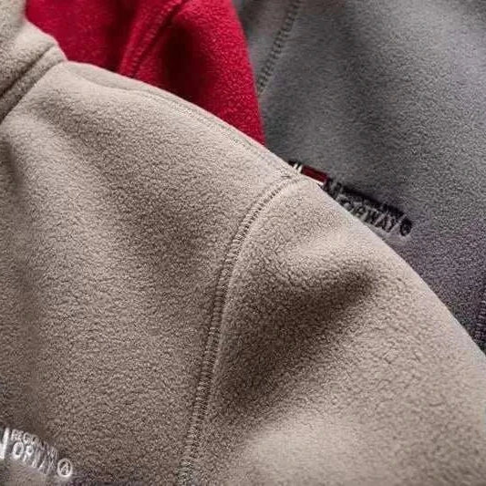 Norway puffer jacket in khaki, red, and gray, showing stylish design and embroidery.