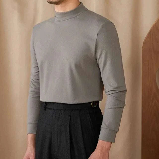 Soft half turtleneck sweater for men, polyester material, cozy and stylish.