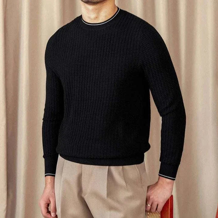 Men's winter wool sweater in black, providing cozy warmth and style.