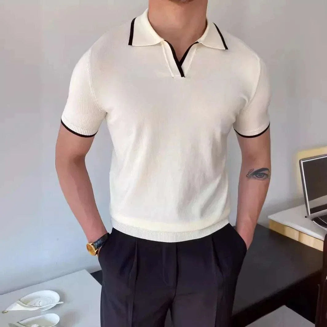 Men's solid polo collar relaxed fit t-shirt in white with black trim.