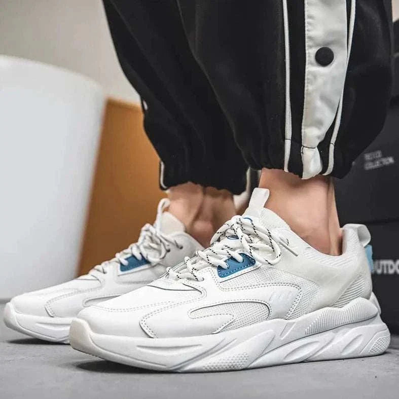 White lightweight comfort sneaker for men, featuring breathable design, ideal for casual wear.