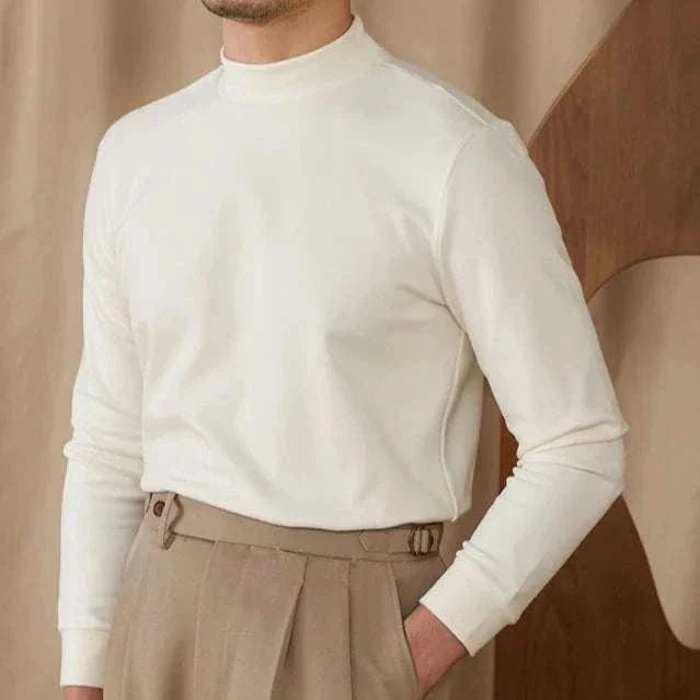 Soft half turtleneck sweater for men in polyester, beige backdrop.