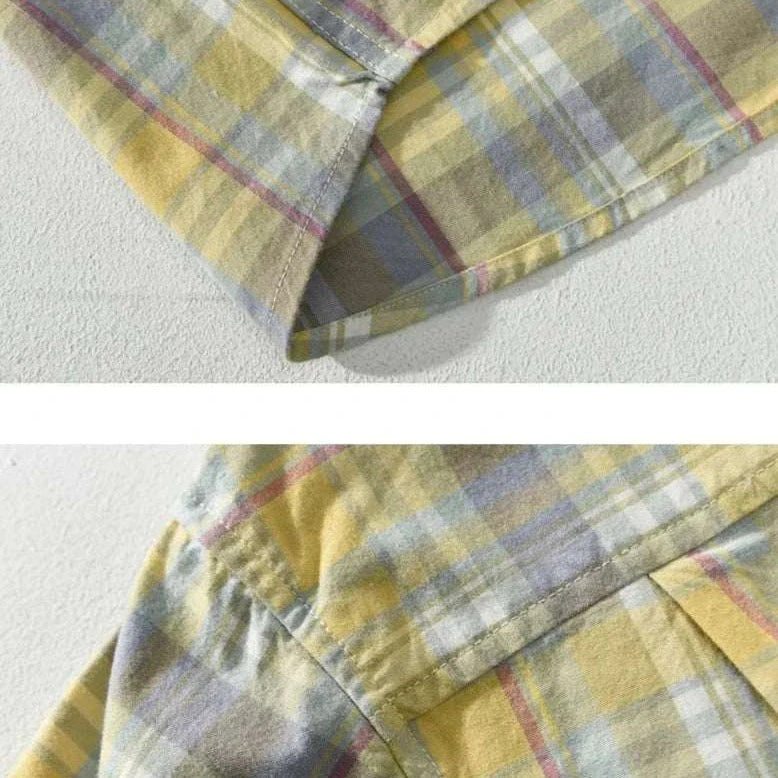 Close-up of yellow and gray plaid pattern on RETRO cotton summer plaid shirt fabric.