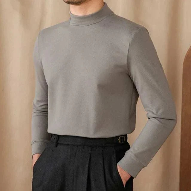 Soft half turtleneck sweater in gray, perfect for cozy men's fashion.