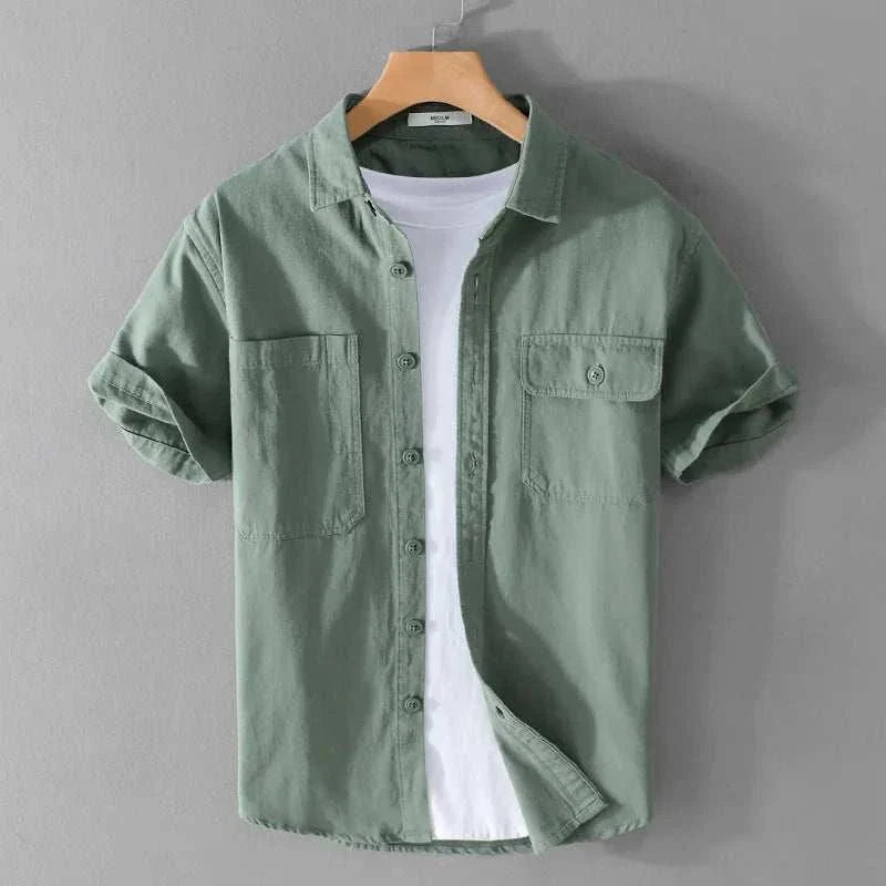 Men's premium short sleeve summer shirt, solid green cotton, casual elegance.