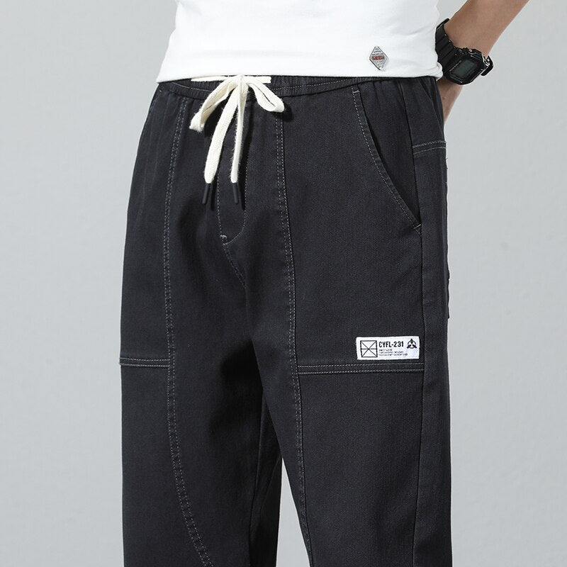 Men's Vinny Denim Joggers in black, relaxed fit for comfort and style.