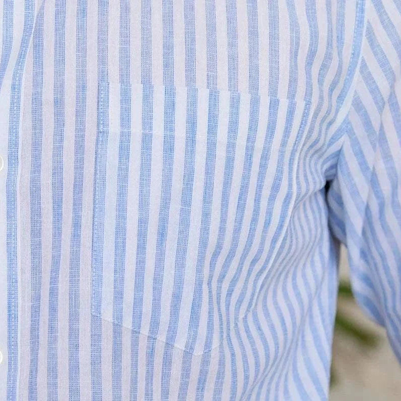 Striped long-sleeve shirt with pocket detail, made of a linen and cotton blend.