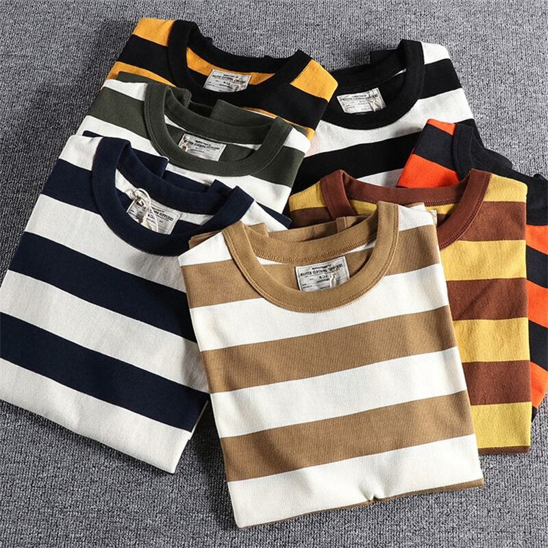 Summer Striped T-Shirt collection in various colors, laid out on fabric background.