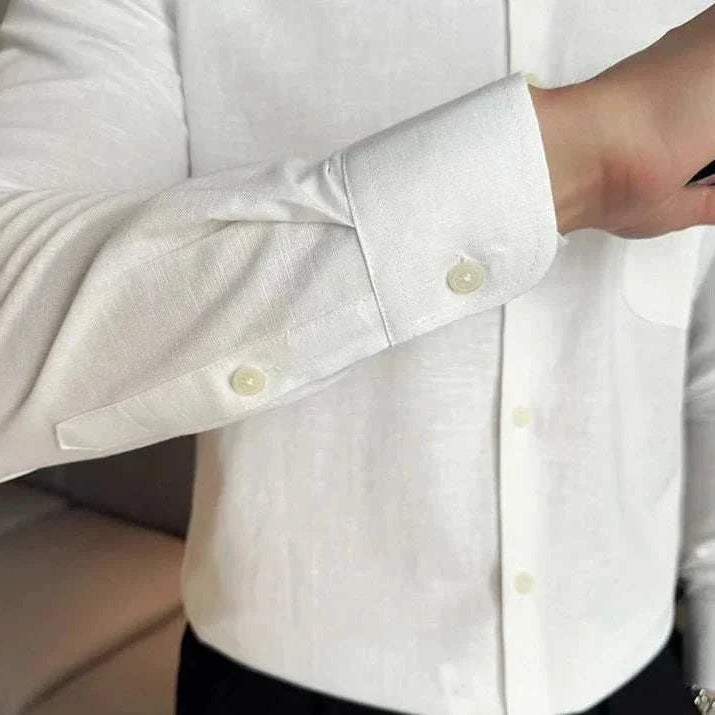 Linen smart casual long-sleeve shirt in white, featuring a solid pattern, ideal for spring/summer.