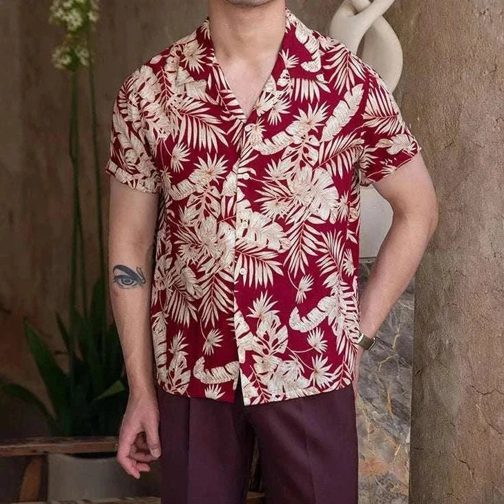 Vintage Hawaiian flower shirt with red and white floral pattern, casual men's summer wear.