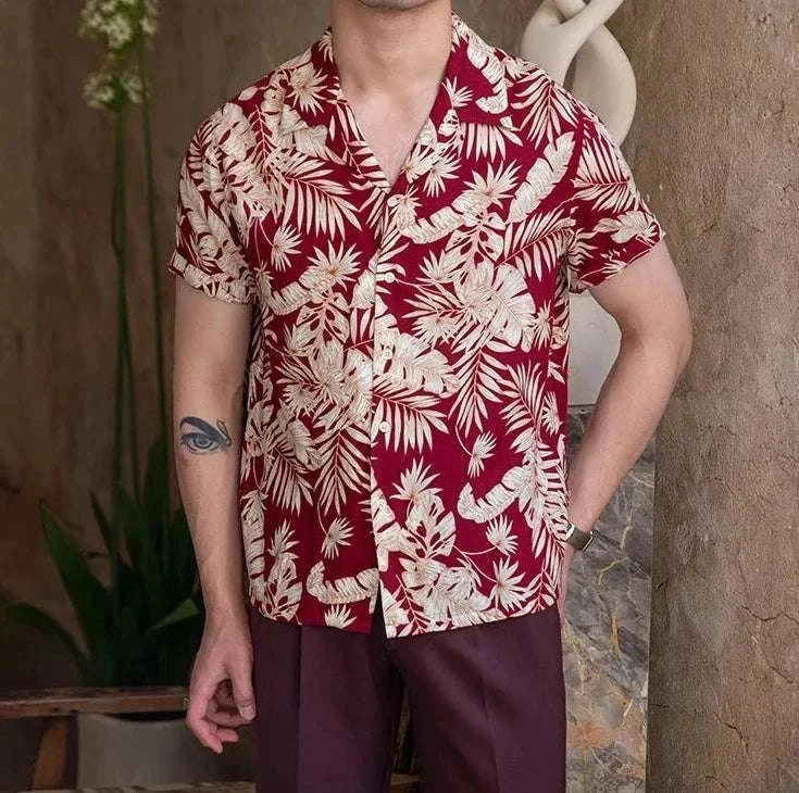 Vintage Hawaiian flower shirt with red and white floral pattern, casual men's summer wear.