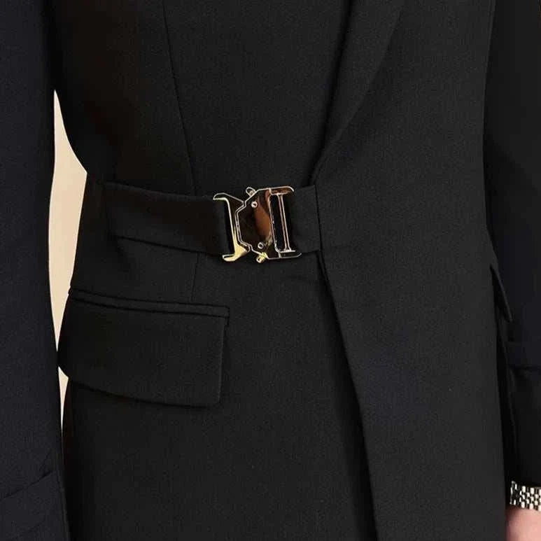 Elegant slim fit suit jacket with sleek metal buckle detail.