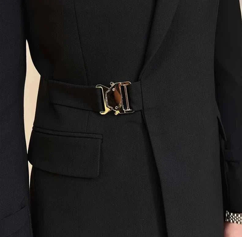Elegant slim fit suit jacket with sleek metal buckle detail.
