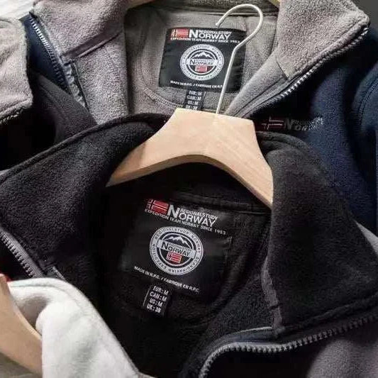 Norway puffer jacket in various colors on hangers showcasing cozy interior lining.