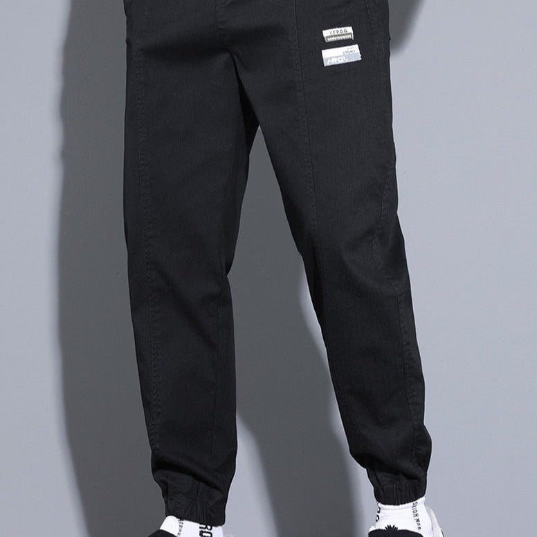 Vinny Loose Pants men's relaxed fit jogging pants in black, comfortable and breathable for casual wear.