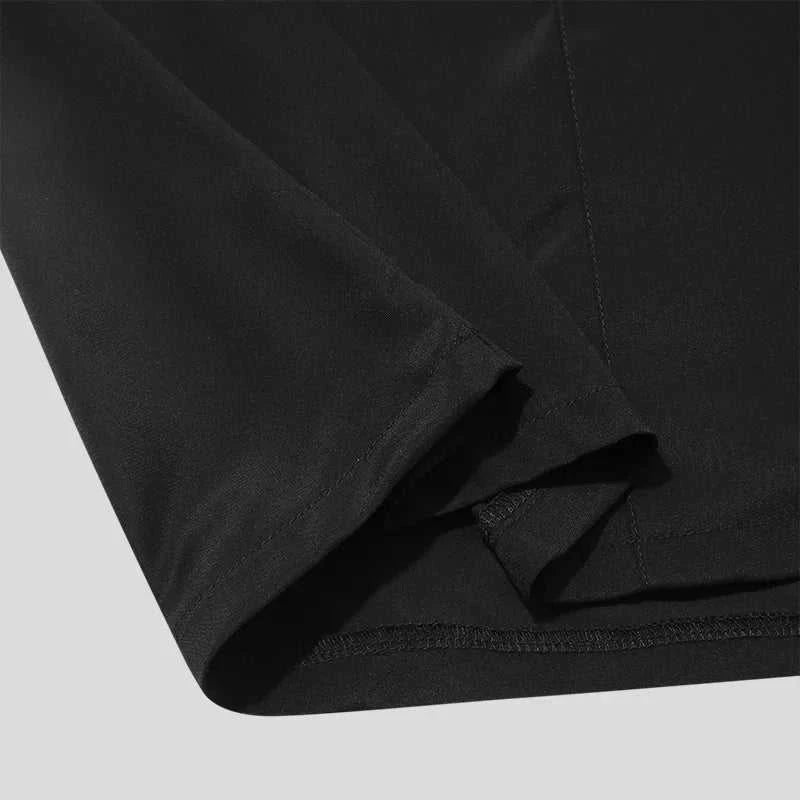 Close-up of Antonios thin long-sleeve shirt fabric in black, showcasing lightweight and breathable material.