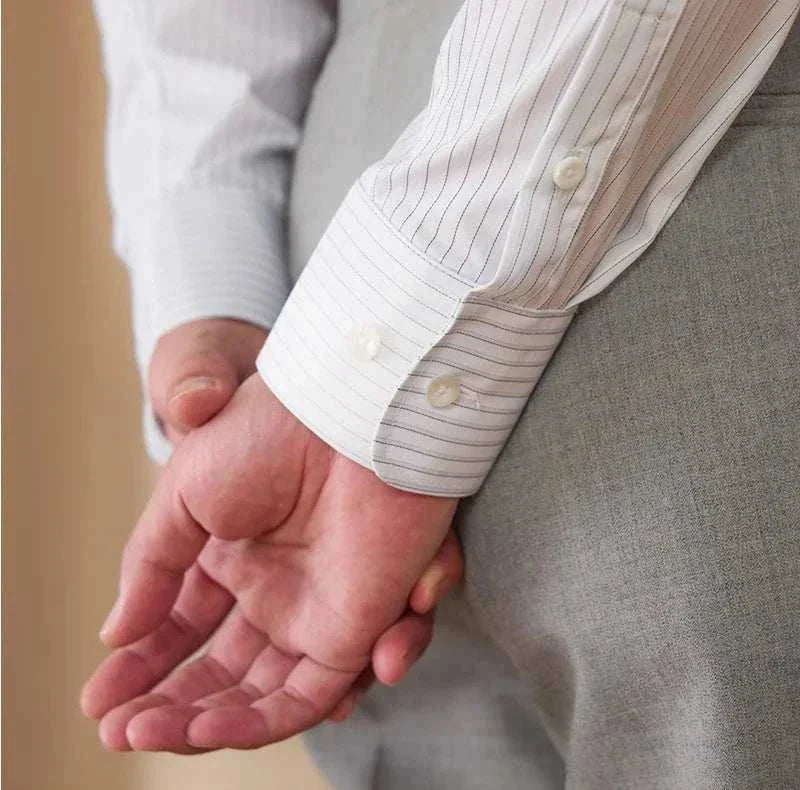 Business slim fit long sleeve premium shirt in white with button cuffs, ideal for professional settings.