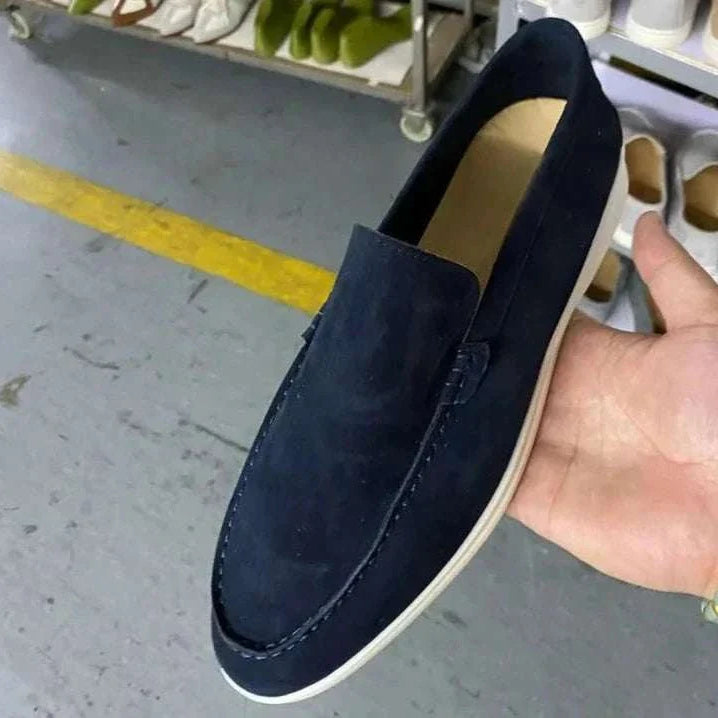 Suede elegant loafers made with soft sheep leather.