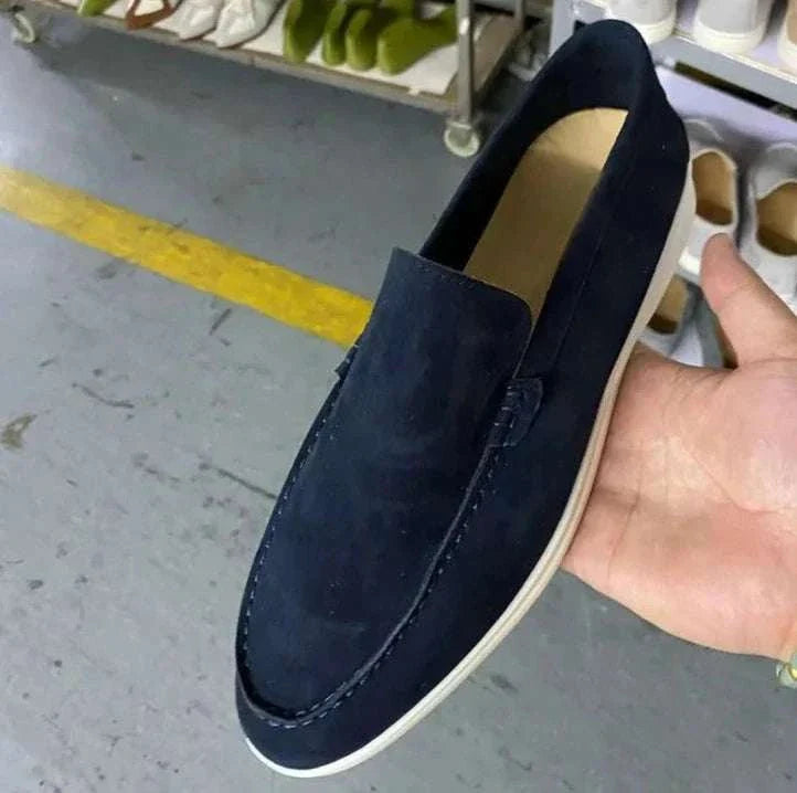 Suede elegant loafers made with soft sheep leather.