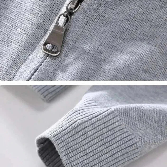 Close-up of a gray smart casual cardigan with zipper and ribbed cuff, 100% cotton material.