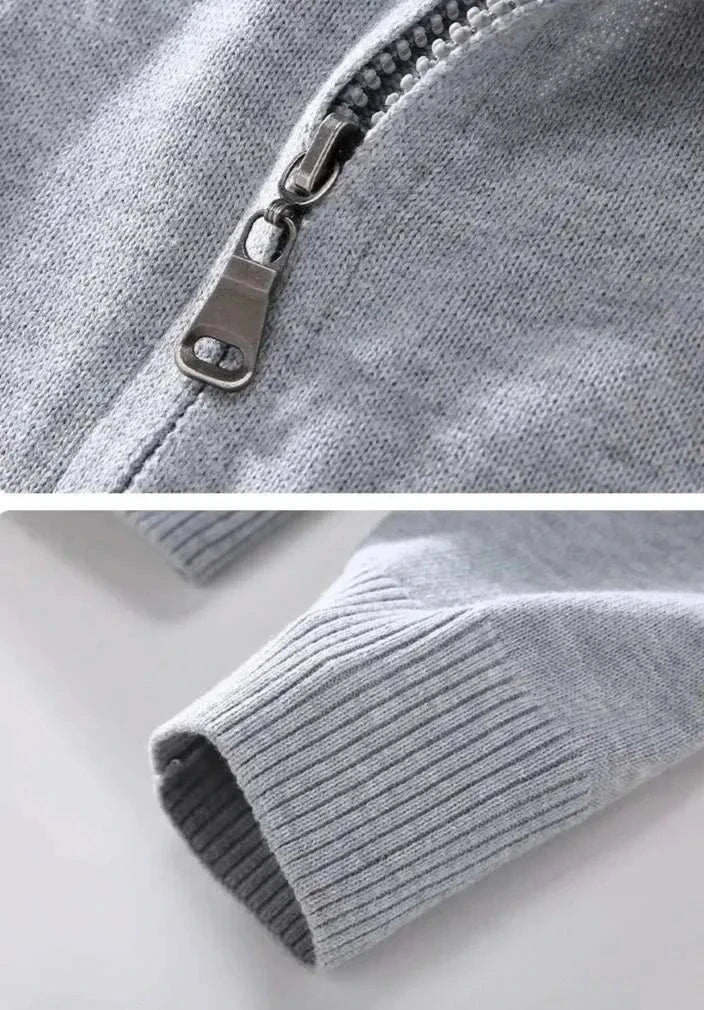 Close-up of a gray smart casual cardigan with zipper and ribbed cuff, 100% cotton material.