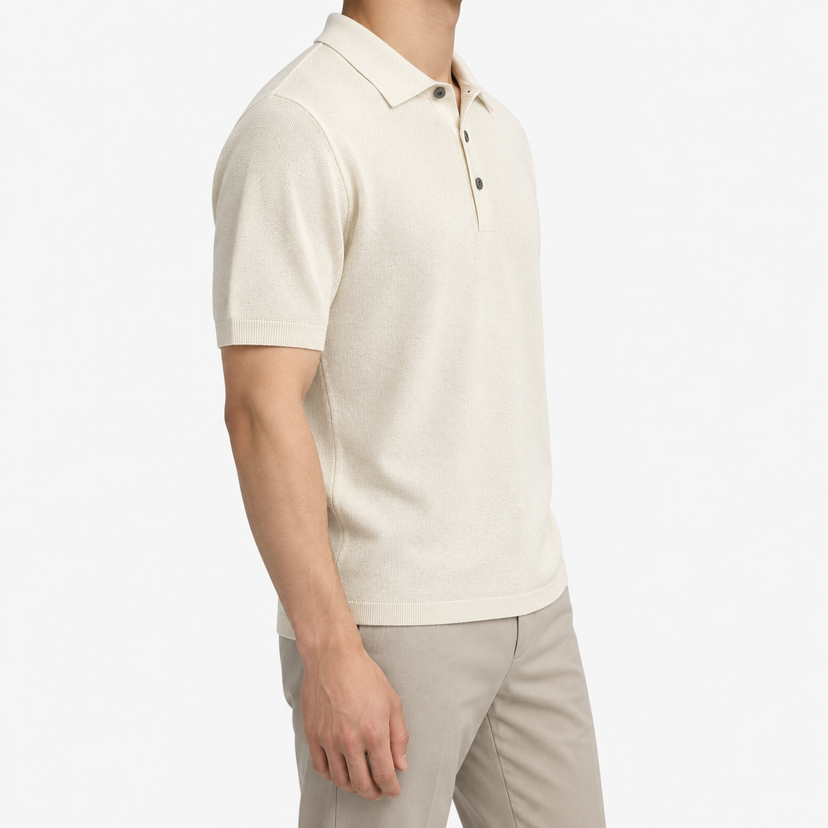 Lyocell silk polo with a fine textured knit in cream, three-quarter model view