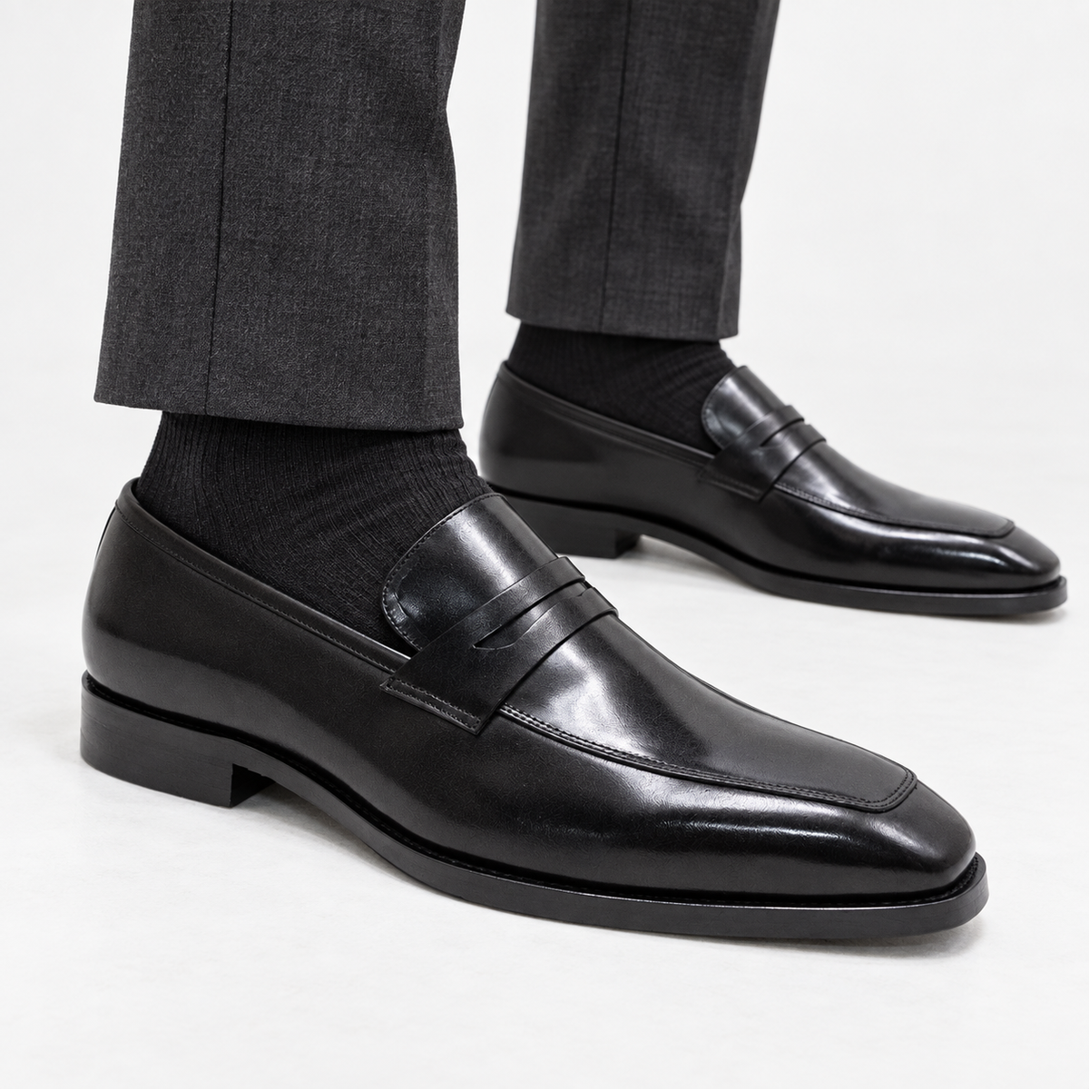 Leonardo formal office loafers in black, side worn view