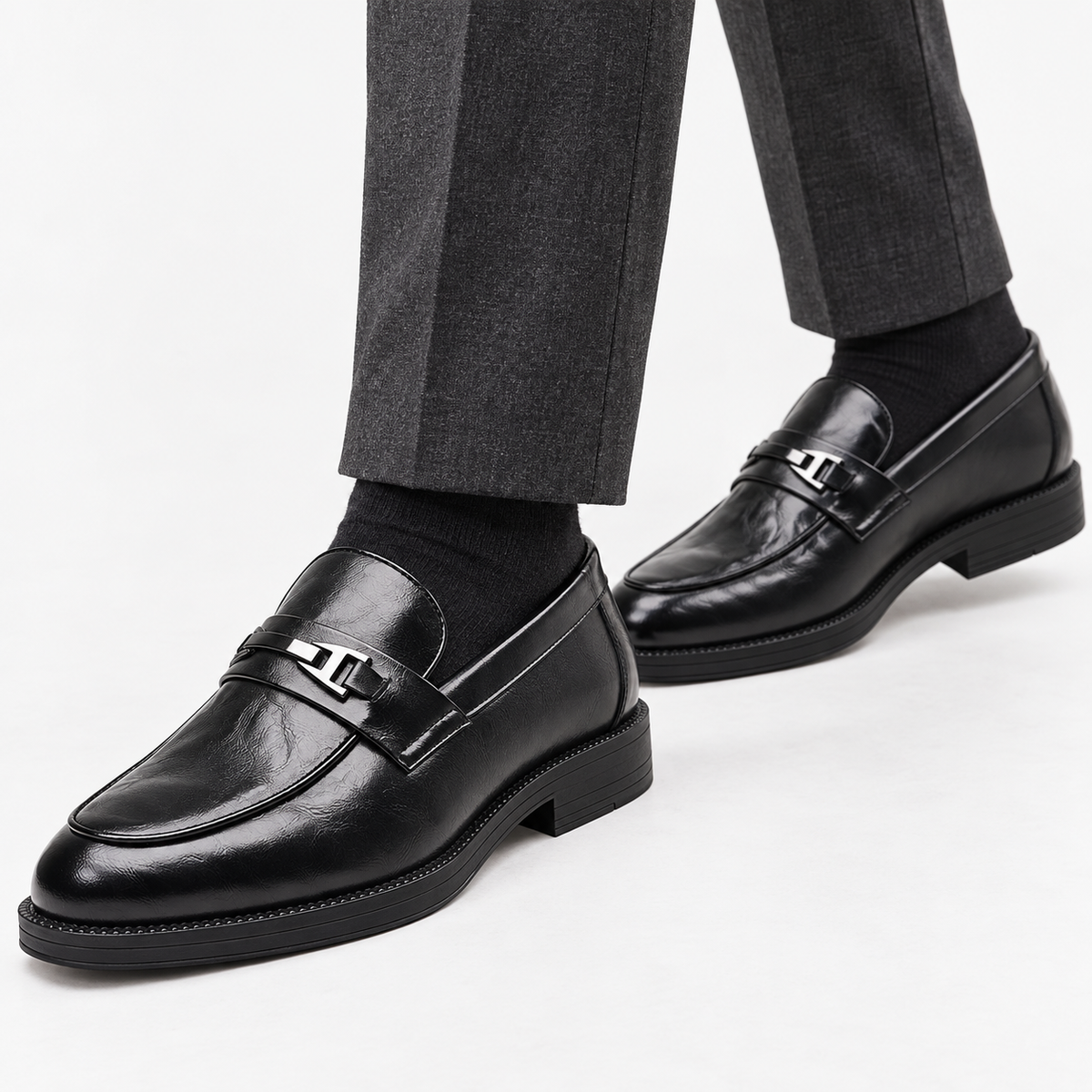 Leonardo slip-on business loafers in black, side worn view