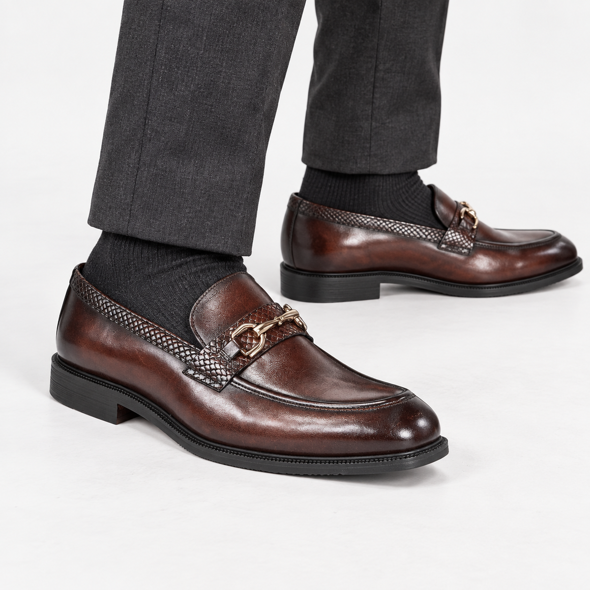Leonardo metal buckles business loafers in brown, side worn view