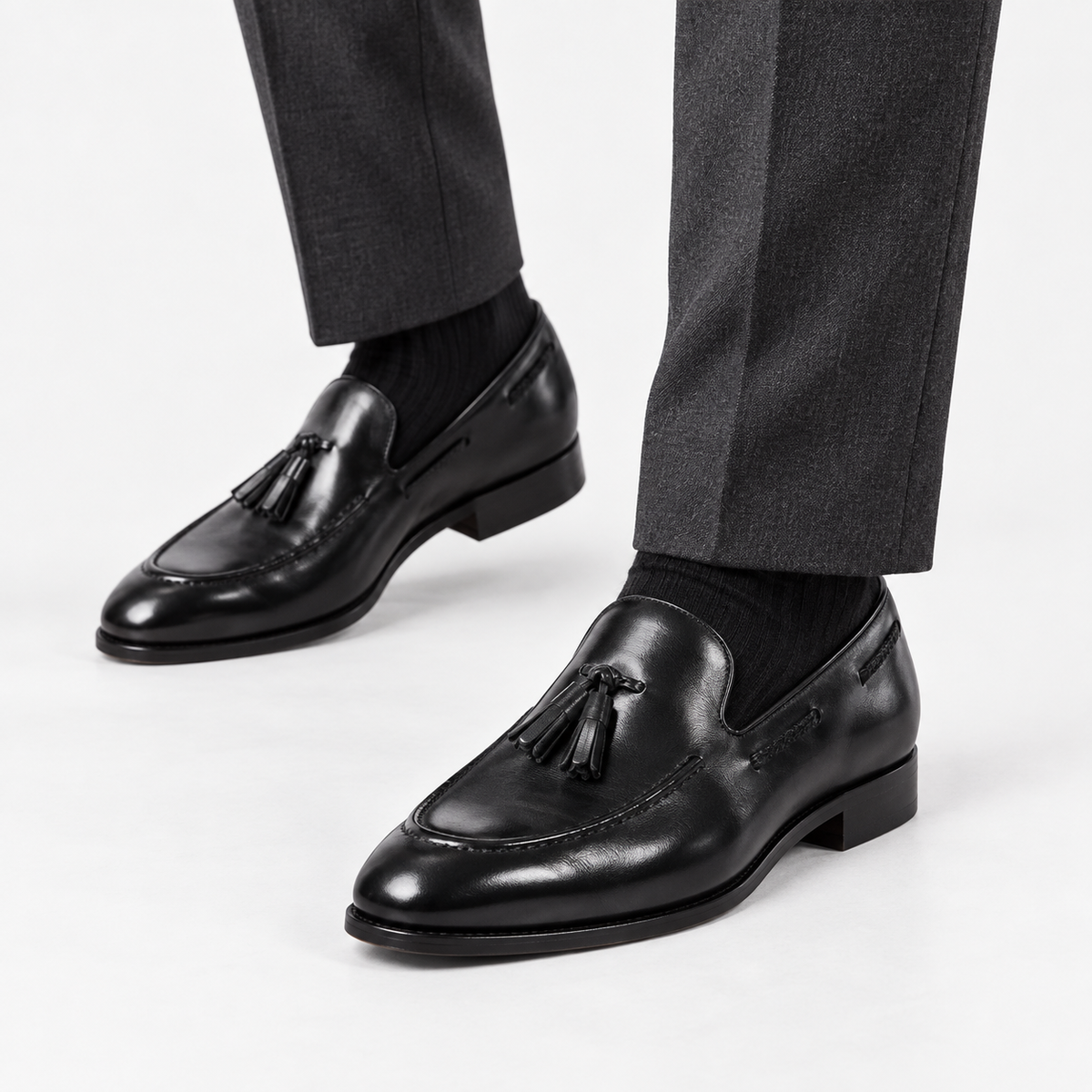 Leonardo tassel genuine leather loafers in black, side worn view