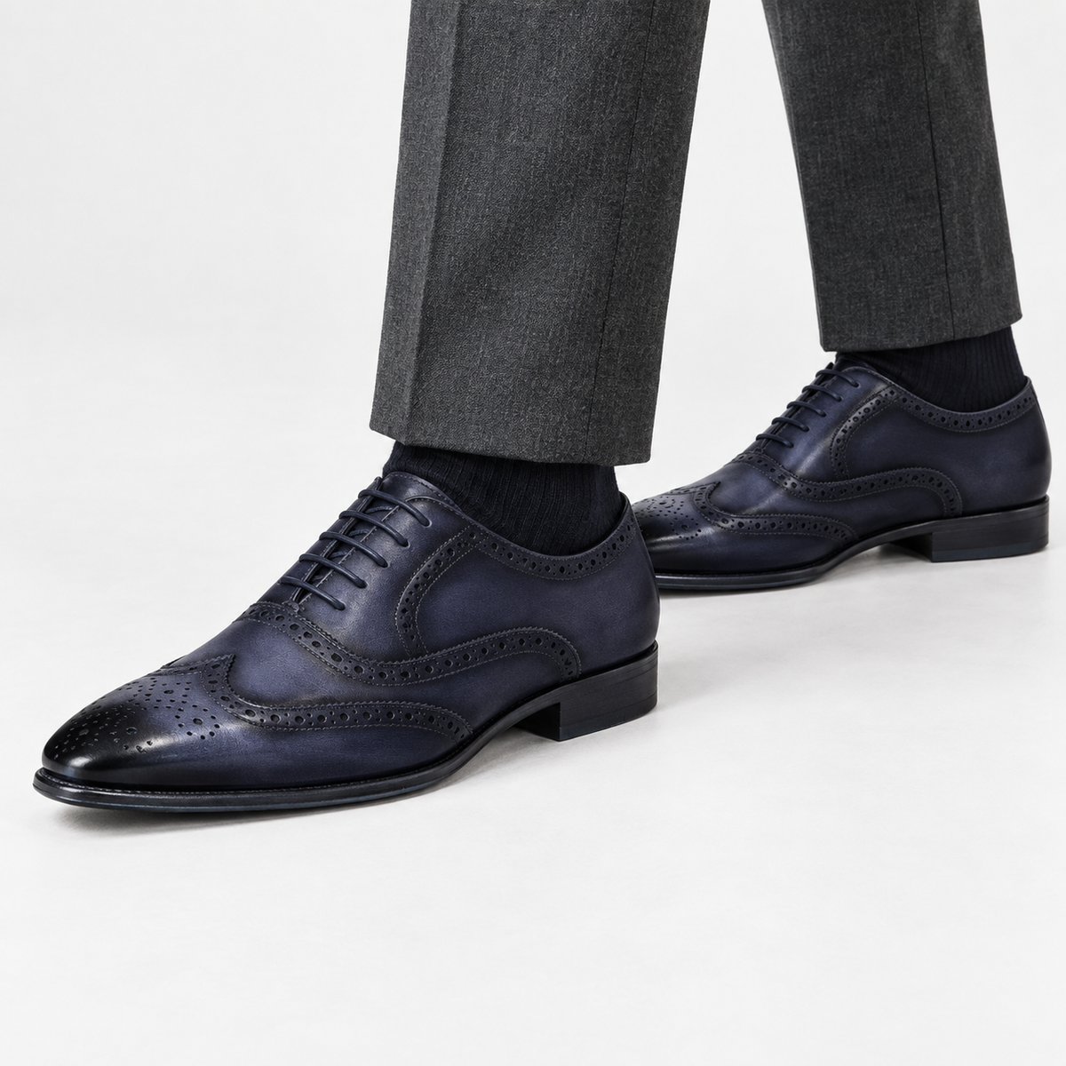 Leonardo genuine leather brogue shoes in gray, side worn view