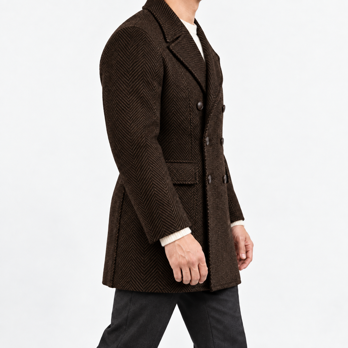 Herringbone double breasted coat with wide lapels in dark brown — male model side view