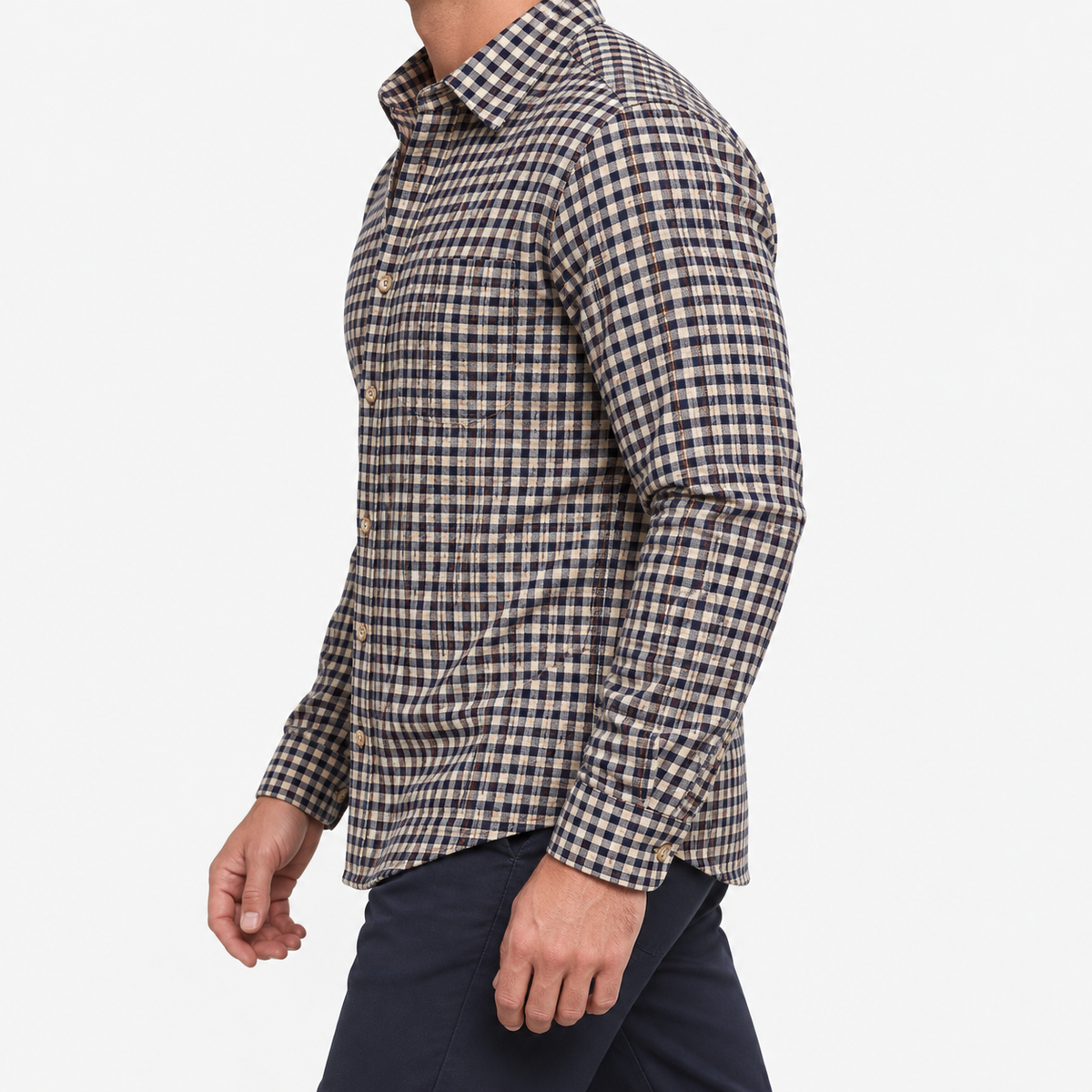 Brushed cotton flannel shirt with a chest pocket in cream gingham on a male model side view