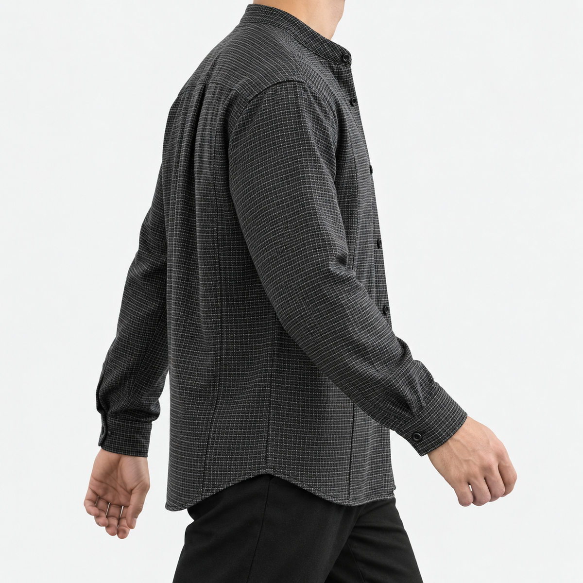 Relaxed checked shirt with curved front seams in dark gray — side view on a male model