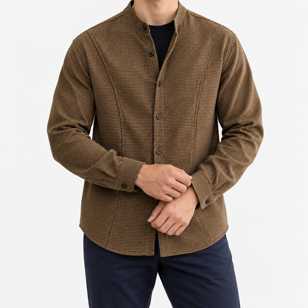 Relaxed checked shirt with curved front seams in brown — front view on a male model