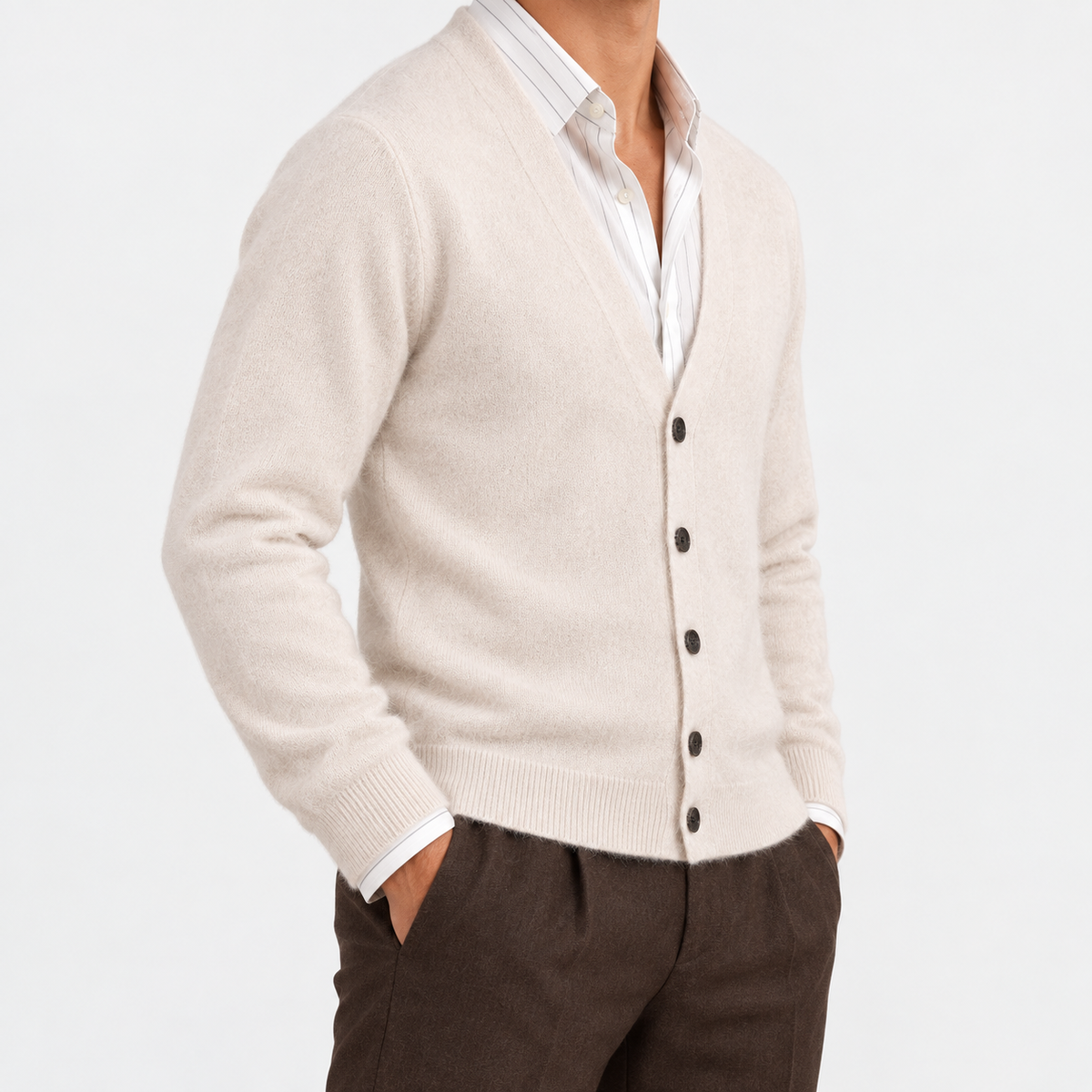 Fine knit cashmere v neck cardigan in cream, side view on a model
