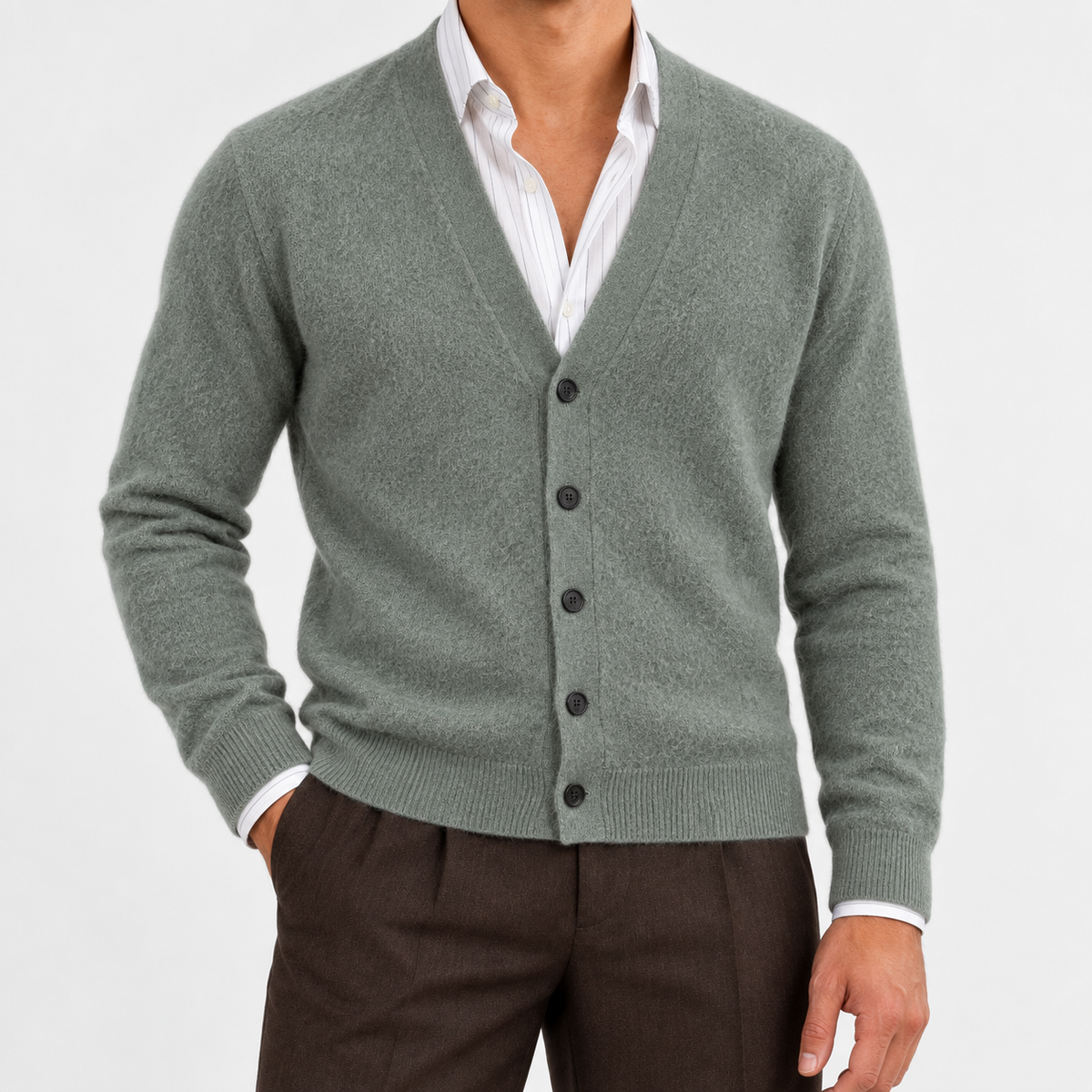 Fine knit cashmere v neck cardigan in sage green, front view on a model
