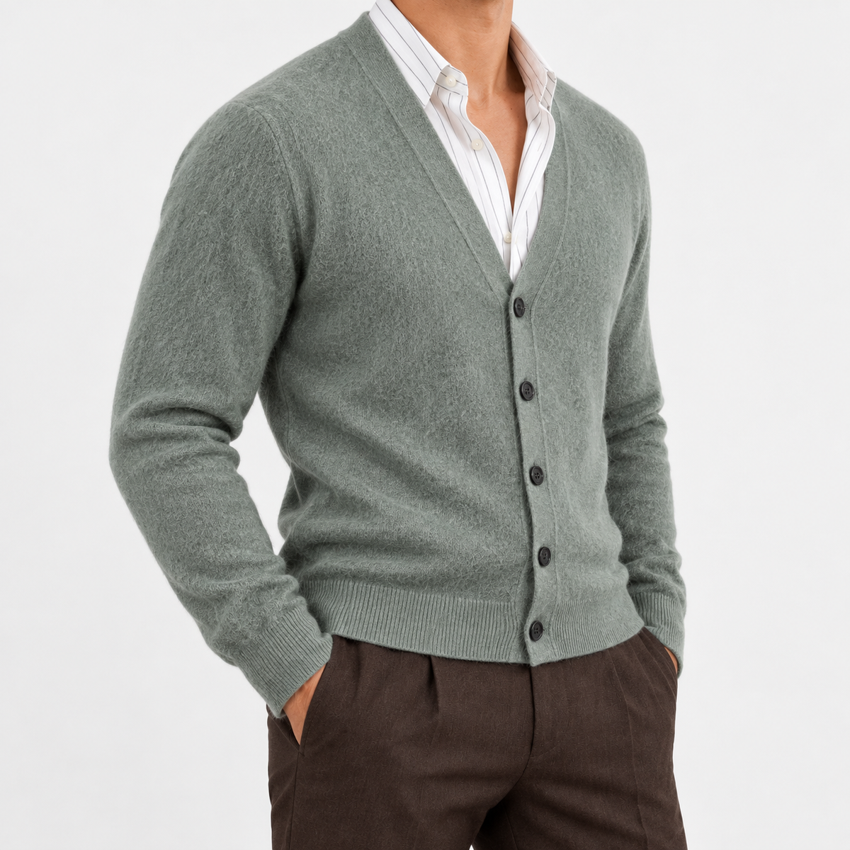 Fine knit cashmere v neck cardigan in sage green, side view on a model
